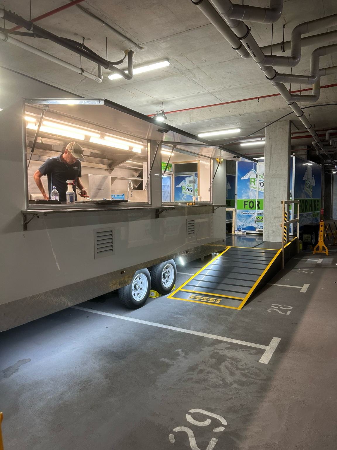 Self-contained portable kitchen trailer on-site